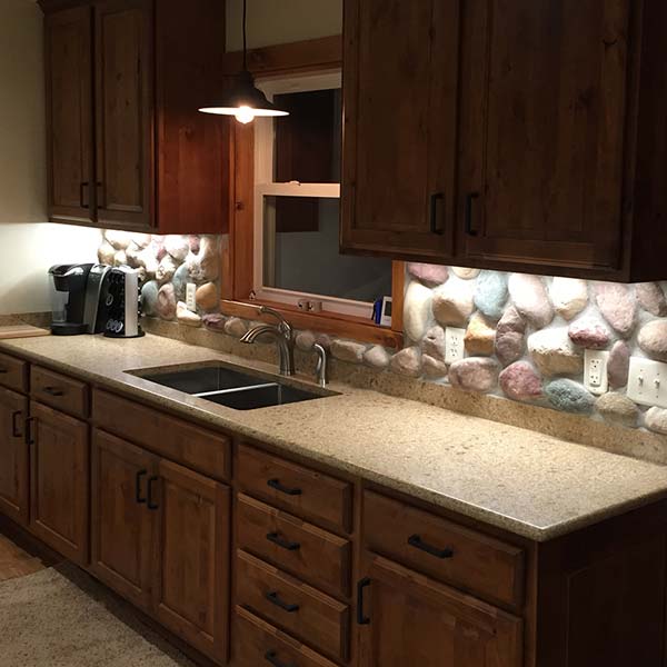 Kitchen dimmable recessed LED lighting with over the sink pendant light in Minocqua, WI